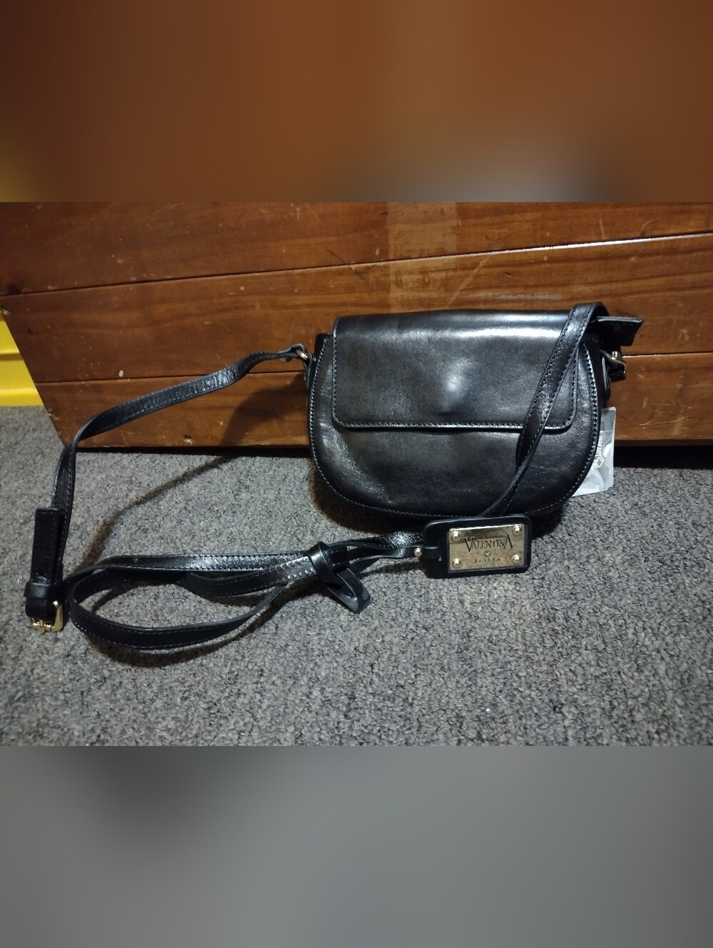 Valentina Black Leather Crossbody Saddle Bag with Gold Plaque